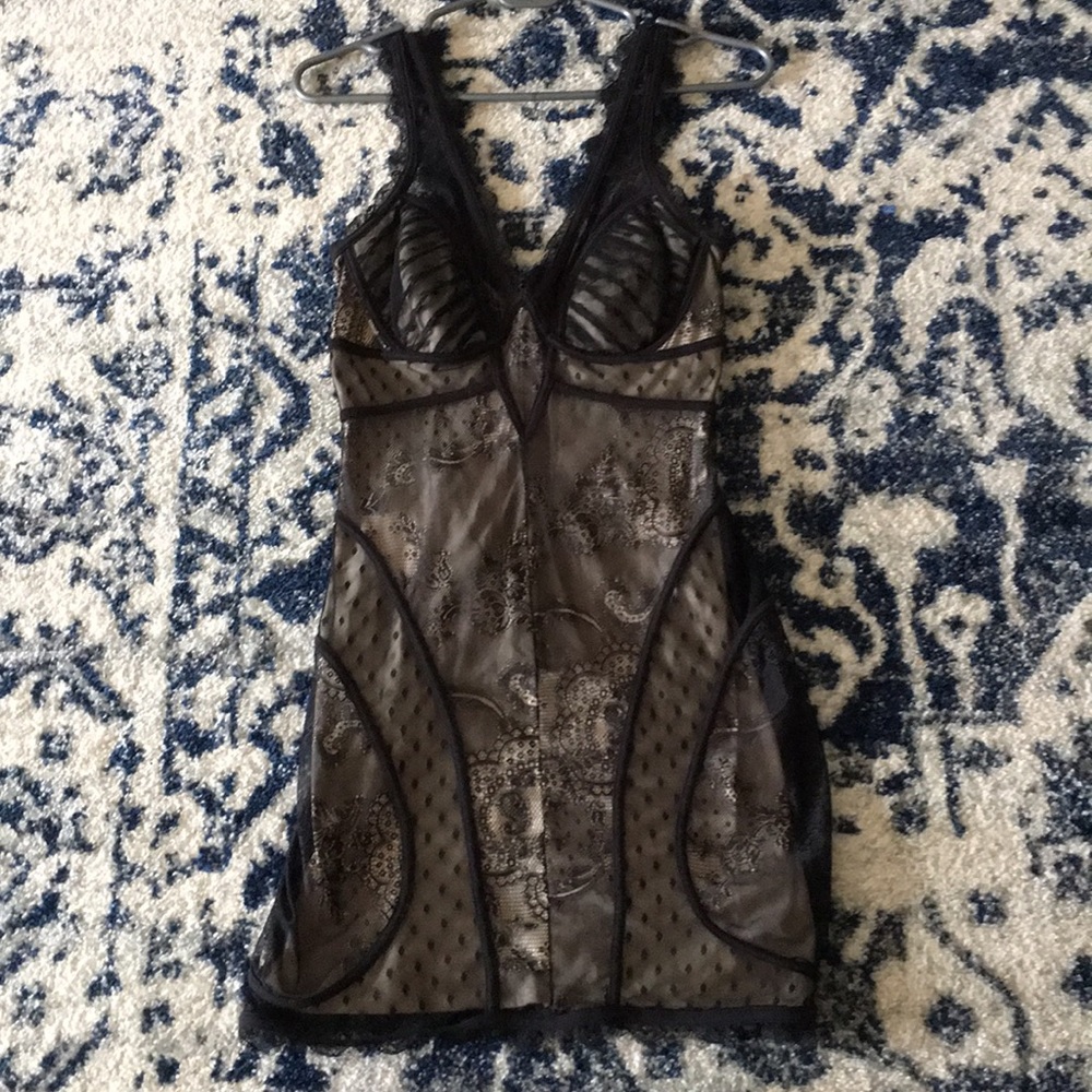 BEBE size xs mini dress with lace detail